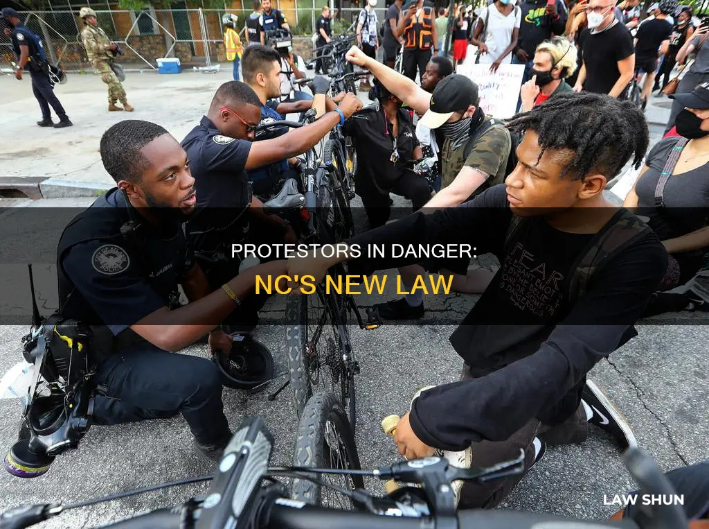 did nc pass law they can run over protestors