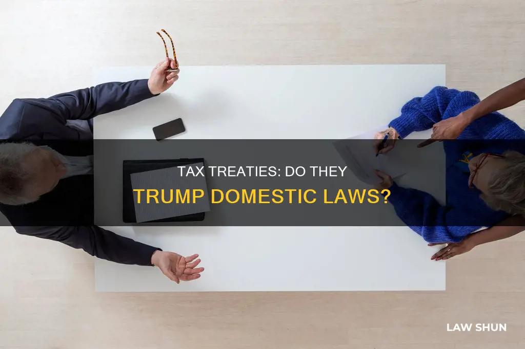 does tax treaty override domestic law
