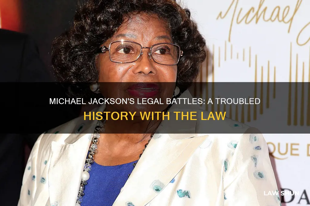 has michael jackson have a run in with the law