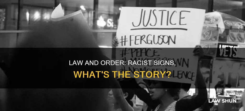 how can you have law and order racist signs