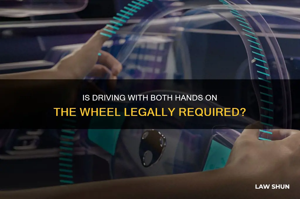 is driving with both hands on the wheel a law