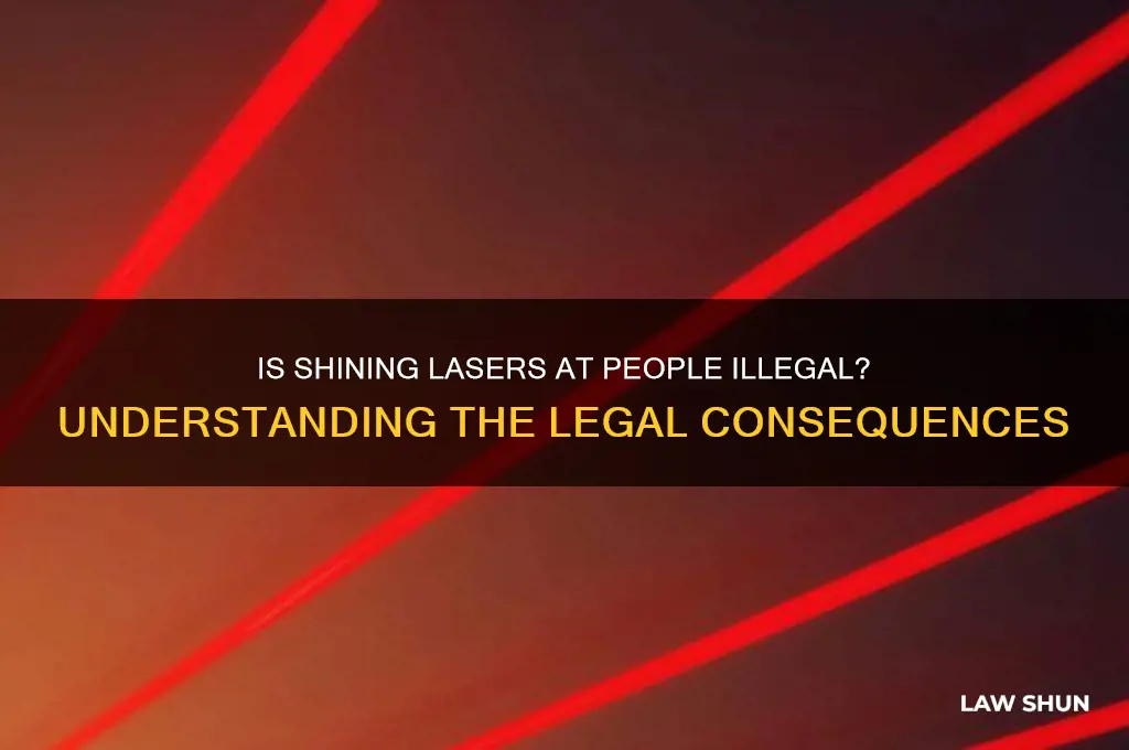is it againist the law to shine lasers at people