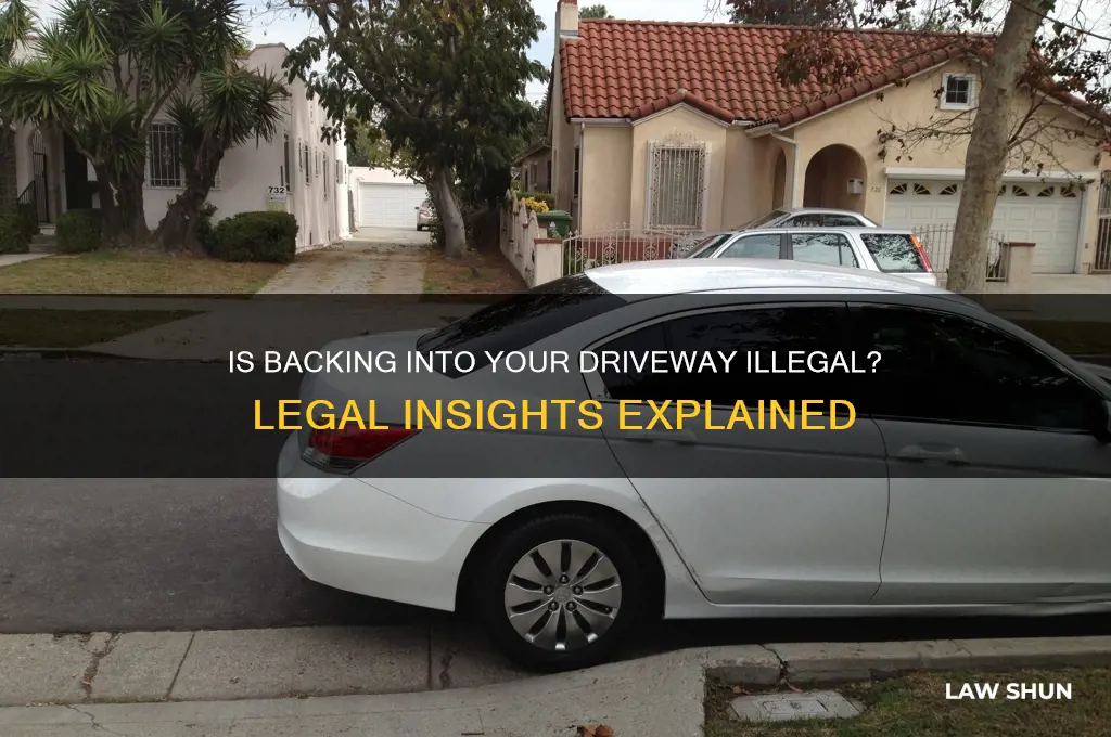 is it against the law to back into your driveway
