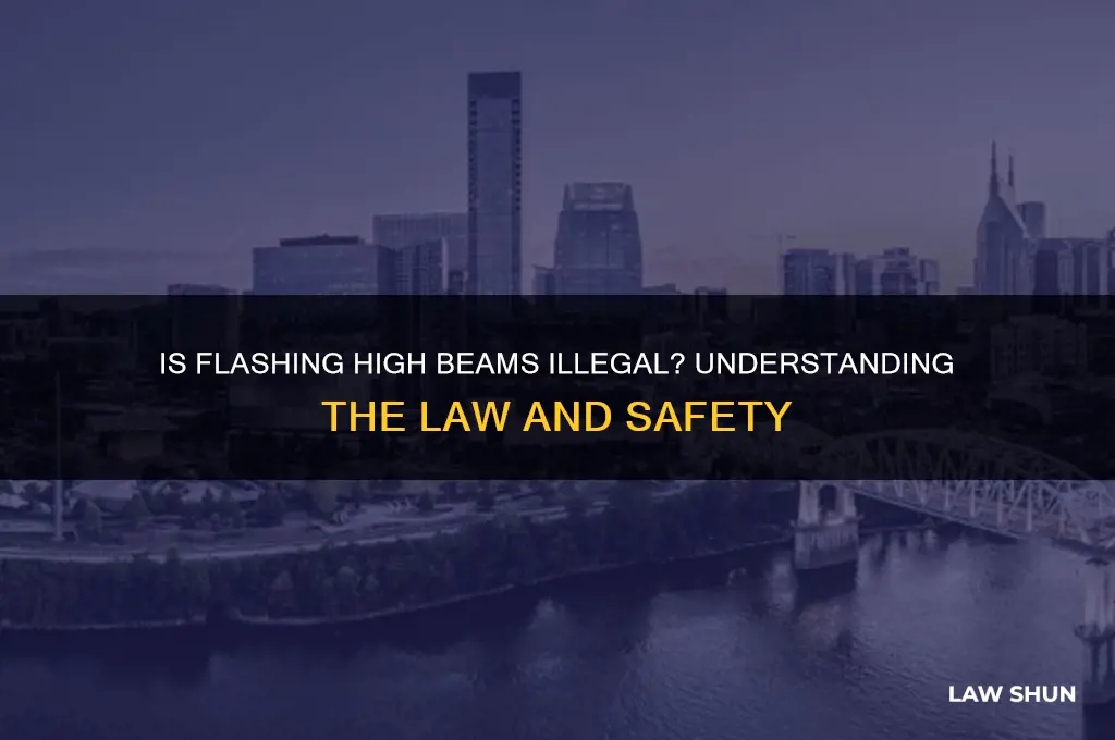 is it against the law to flash your high beams