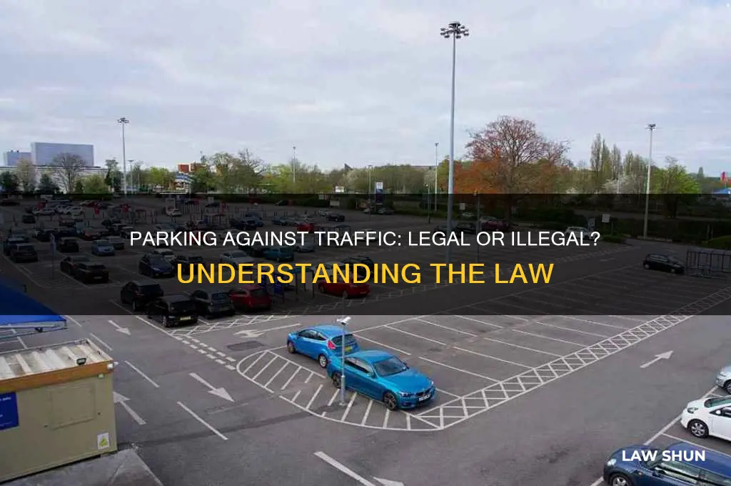 is it against the law to park facing oncoming traffic