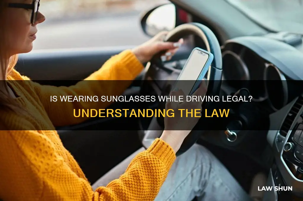 is it against the law to wear sunglasses while driving
