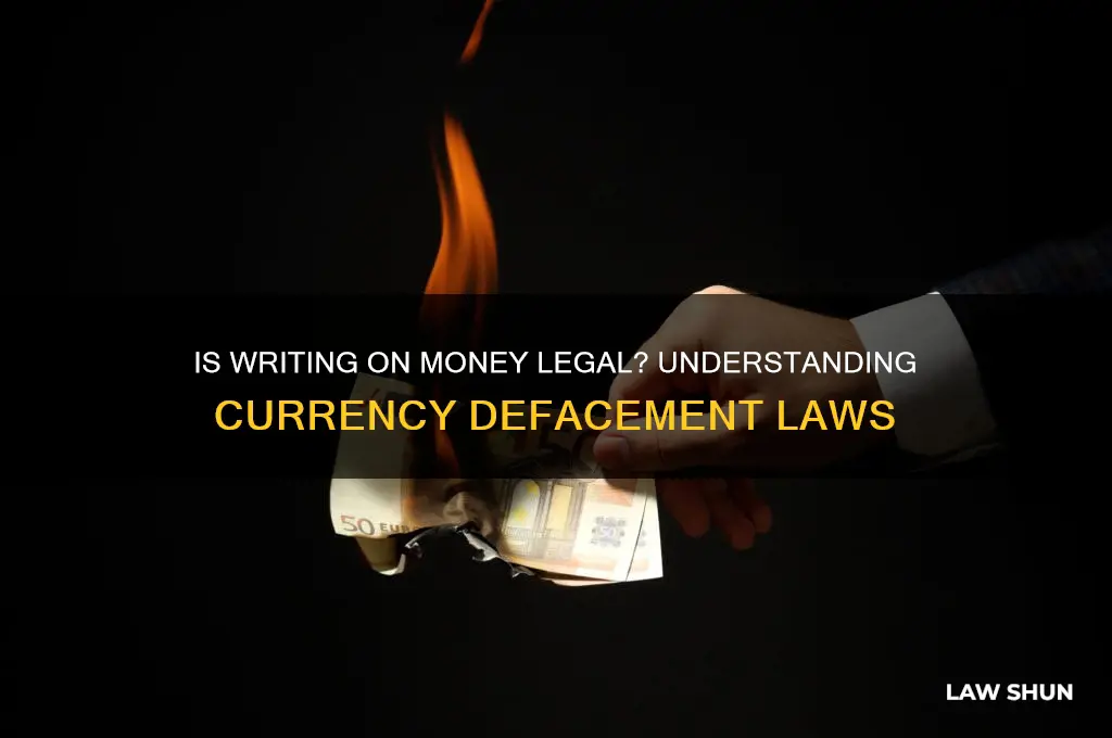 is it against the law to write on currency
