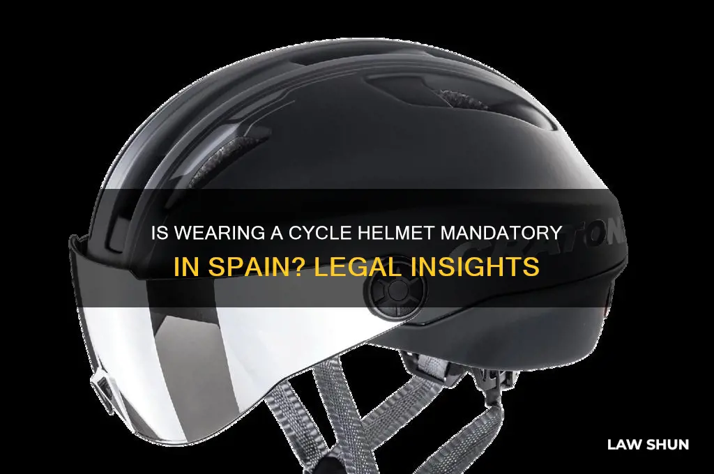 is it law to wear a cycle helmet in spain