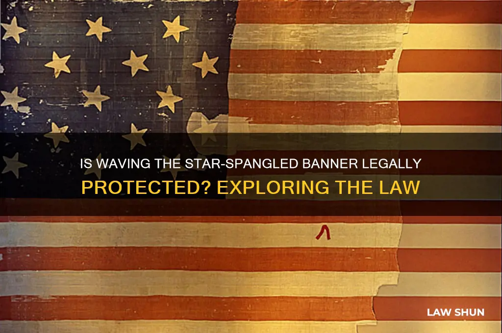 is there a law for star spangled banner waving somewhere
