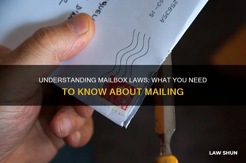 what is the law about putting mail in a mailbox