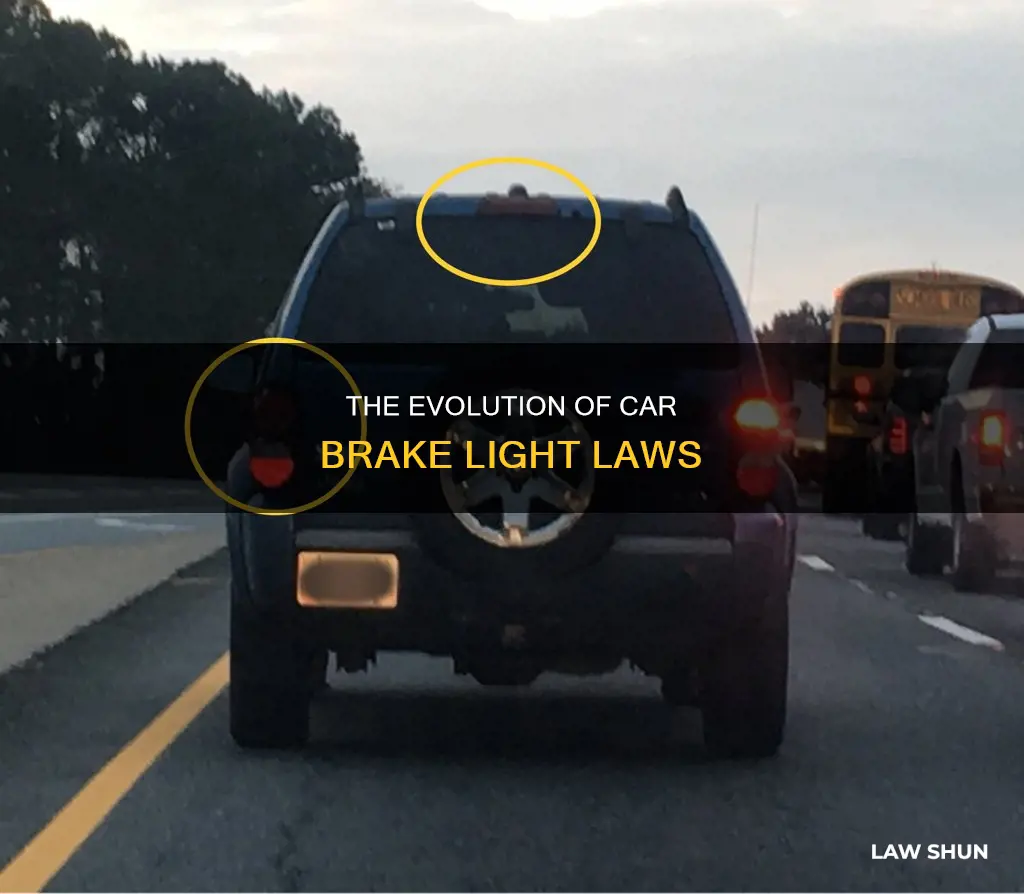 when did two brake lights on a car become law